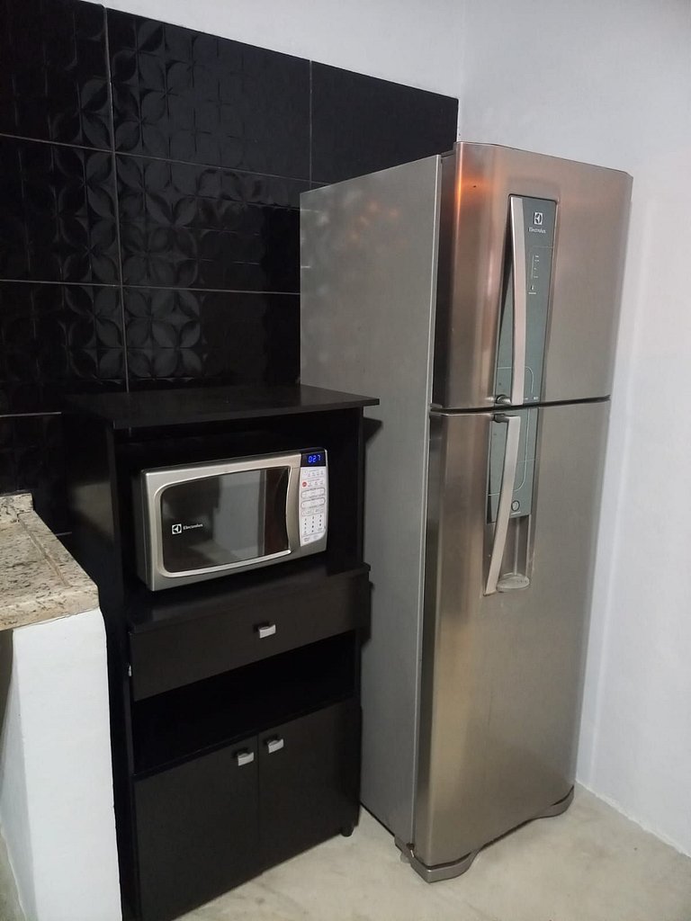 Suíte com ar e churrasqueira - Pereque100