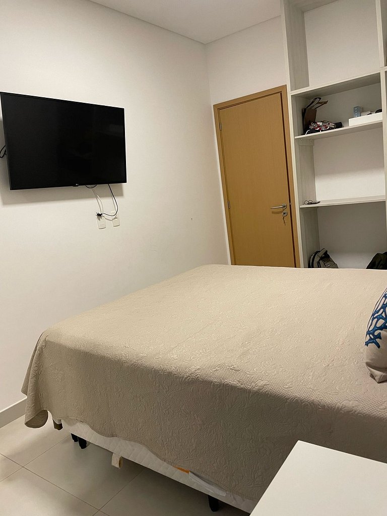 Apartamento com churrasqueira e jardim no DNA105