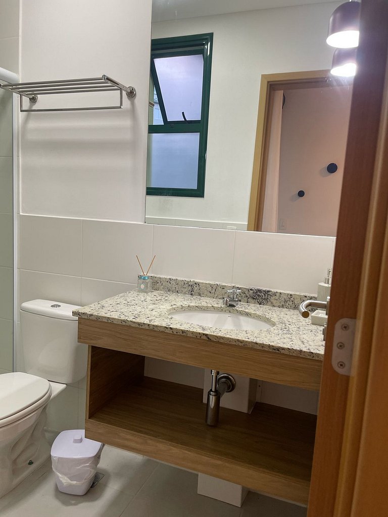 Apartamento com churrasqueira e jardim no DNA105