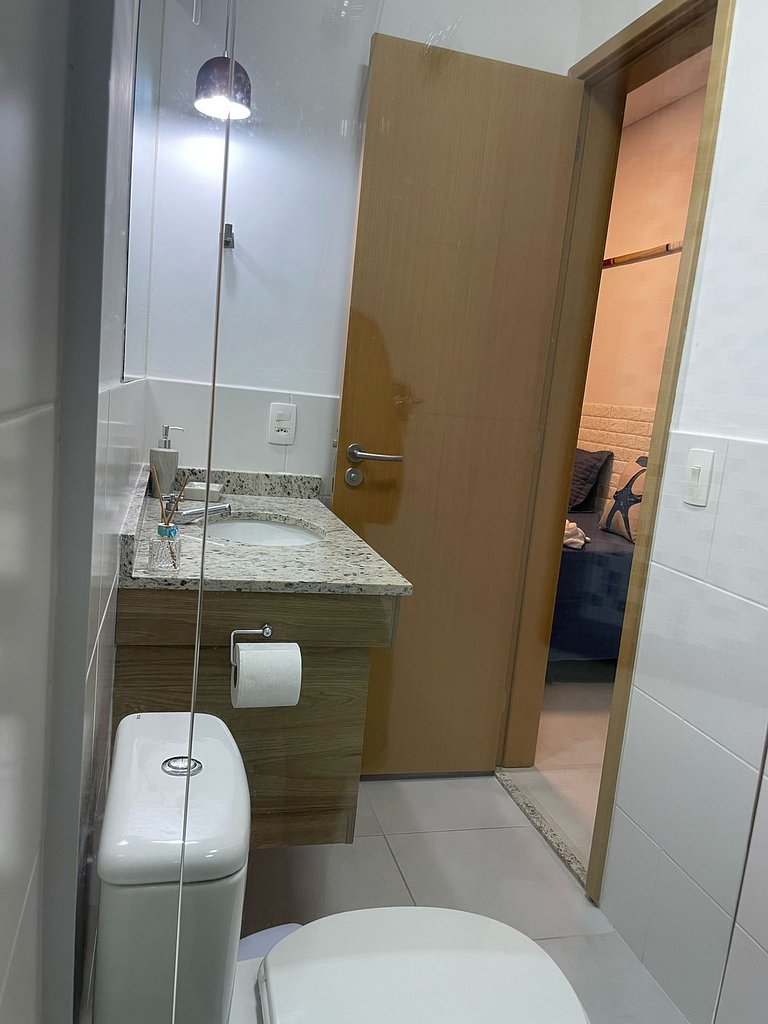Apartamento com churrasqueira e jardim no DNA105