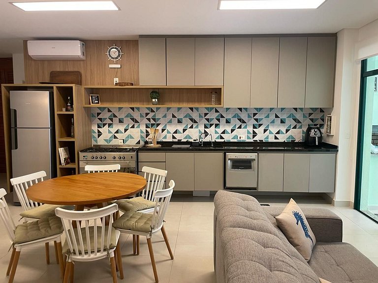 Apartamento com churrasqueira e jardim no DNA105