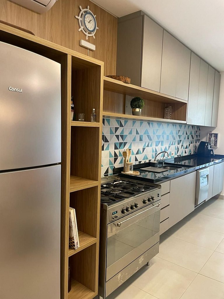 Apartamento com churrasqueira e jardim no DNA105